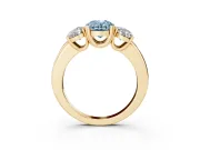 Fancy Blue Oval Cut Diamond Three-Stone Ring Set in Yellow gold with Polished Band and Prong Setting