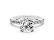 Cushion Cut Diamond Solitaire Set in Silver with Round Pavé Band and Prong Setting