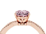 Fancy Pink Oval Cut Diamond Solitaire Ring Set in Rose gold with Twisted Band and Bead Prong Setting