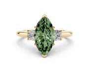 Fancy Green Three-Stone Marquise Cut Diamond Ring Set in Yellow gold with Prong Setting and Plain Band