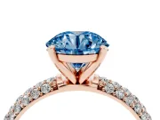 Fancy Blue Round Cut Diamond Solitaire Ring Set in Rose gold with Prong Setting and Pavé-Set Band