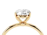 Oval Cut Diamond Solitaire Engagement Ring Set in Yellow gold with Thin Band and Prong Setting