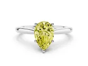 Fancy Yellow Pear Cut Diamond Solitaire Ring Set in Silver with Cathedral Band and Prong Setting