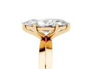 Marquise Cut Diamond Solitaire Engagement Ring Set in Yellow gold with Flat Band and Prong Setting