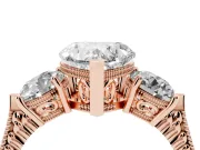 Heart Cut Diamond Three-Stone Ring Set in Rose gold with Milgrain Band