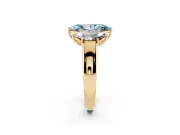 Fancy Blue Three-Stone Marquise Cut Diamond Ring Set in Yellow gold with Matching Prong Settings and Plain Band