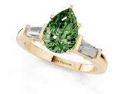 Fancy Green Pear Cut Diamond Solitaire Ring Set in Yellow gold with Tapered Baguette Accents and Prong Setting