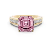 Fancy Pink Asscher Cut Diamond Solitaire Ring Set in Yellow gold with Channel-Set Band and Prong Setting