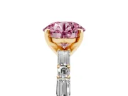Fancy Pink Round Cut Diamond Solitaire Set in Yellow gold with Side Baguettes and Channel Set Band