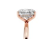 Radiant Cut Diamond Solitaire Engagement Ring Set in Rose gold with Prong Setting and Polished Band