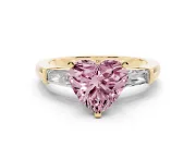 Fancy Pink Heart Cut Diamond Solitaire Ring Set in Yellow gold with Tapered Baguette Side Stones and Prong Setting