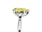 Fancy Yellow Pear Cut Diamond Solitaire Engagement Ring Set in Platinum with Prong Setting and Polished Band