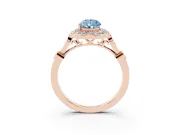 Fancy Blue Pear Cut Diamond Halo Engagement Ring Set in Rose gold with Twisted Band and Prong Setting