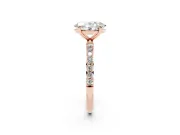Oval Cut Diamond Solitaire Ring Set in Rose gold with Round Pavé Band and Prong Setting