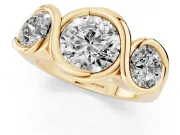 Round Cut Diamond Three-Stone Wave Ring Set in Yellow gold with Bezel Setting