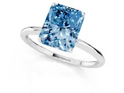 Fancy Blue Radiant Cut Diamond Solitaire Engagement Ring Set in White gold with Thin Band and Prong Setting