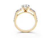Round Cut Diamond Engagement Ring Set in Yellow gold with Baguette Side Stones and Channel Set Band