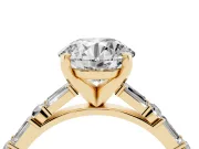 Round Cut Diamond Solitaire Set in Yellow gold with Side Baguettes and Channel Set Band