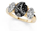 Fancy Black Oval Cut Diamond Three-Stone Ring Set in Yellow gold with Bold Center and Classic Band