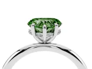 Fancy Green Heart Cut Diamond Solitaire Ring Set in Silver with Thin Band and Prong Setting