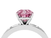 Fancy Pink Cushion Cut Diamond Solitaire Ring Set in White gold with Channel-Set Baguette Band and Prong Setting