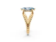Fancy Blue Marquise Cut Diamond Halo Ring Set in Yellow gold with Twisted Band and Prong Setting