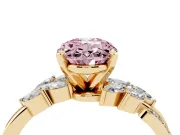 Fancy Pink Oval Cut Diamond Solitaire Ring Set in Yellow gold with Marquise Twist Band and Prong Setting