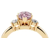 Fancy Pink Three-Stone Marquise Cut Diamond Ring Set in Yellow gold with Prong Setting and Plain Band