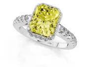 Fancy Yellow Radiant Cut Diamond Halo Engagement Ring Set in White gold with Pavé Band and Prong Setting
