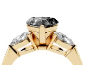Fancy Black Three-Stone Heart Cut Diamond Ring Set in Yellow gold with Pear Side Stones and Prong Setting