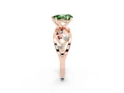 Fancy Green Pear Cut Diamond Solitaire Ring Set in Rose gold with Side Stones on Criss-Cross Band and Prong Setting