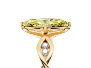 Fancy Yellow Marquise Cut Diamond Twist Band Solitaire Ring Set in Yellow gold with Leaf Prong Setting and Accent Stones