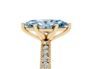 Fancy Blue Marquise Cut Diamond Solitaire Ring Set in Yellow gold with Slim Pavé Band and Prong Setting