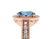 Fancy Blue Oval Cut Diamond Halo Ring Set in Rose gold with Round Accent Halo, Pavé Band and Prong Setting