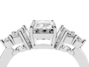 Emerald Cut Diamond Solitaire Ring Set in White gold with Cluster Accents on Each Side