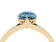 Fancy Blue Emerald Cut Diamond Solitaire Ring Set in Yellow gold with Polished Tapered Band and Prong Setting