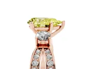 Pear-Shaped Three-Stone Twist Engagement Ring Setting for a Fancy Yellow Lab-Grown Diamond | Rose Gold