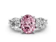 Fancy Pink Oval Cut Diamond Three-Stone Ring Set in White gold with Prong Setting and Classic Band