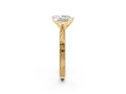 Pear Cut Diamond Solitaire Milgrain Engraved Band Set in Yellow gold with Prong Setting