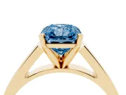 Fancy Blue Radiant Cut Diamond Solitaire Engagement Ring Set in Yellow gold with Prong Setting and Tapered Band
