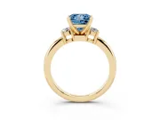 Fancy Blue Three-Stone Princess Cut Diamond Ring Set in Yellow gold with Prong Setting and Plain Band