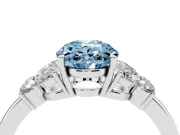 Fancy Blue Oval Cut Diamond Solitaire Floral Ring Set in Platinum with Marquise Petals and Prong Setting