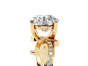 Round Cut Diamond Pavé Twist Band Solitaire Ring Set in Yellow gold with Prong Setting