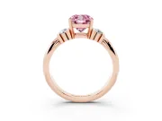 Fancy Pink Three-Stone Cushion Cut Diamond Channel Set Ring Set in Rose gold with Bar Prongs
