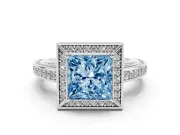 Fancy Blue Princess Cut Diamond Halo Pavé Split Shank Ring Set in Platinum with Prong Setting