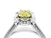 Fancy Yellow Pear Cut Diamond Pavé Split Shank Solitaire Ring Set in White gold with Prong Setting