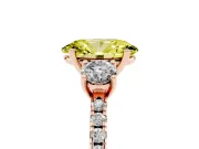 Fancy Yellow Oval Cut Diamond Three-Stone Ring Set in Rose gold with Pavé Band and Graduated Sides