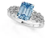 Fancy Blue Emerald Cut Diamond Cluster Engagement Ring Set in Platinum with Pavé Band and Prong Setting