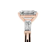Emerald Cut Diamond Solitaire Ring Set in Rose gold with Tapered Baguette Side Stones and Prong Setting