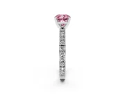 Fancy Pink Cushion Cut Diamond Solitaire Ring Set in Platinum with Slim Pavé Band and Prong Setting